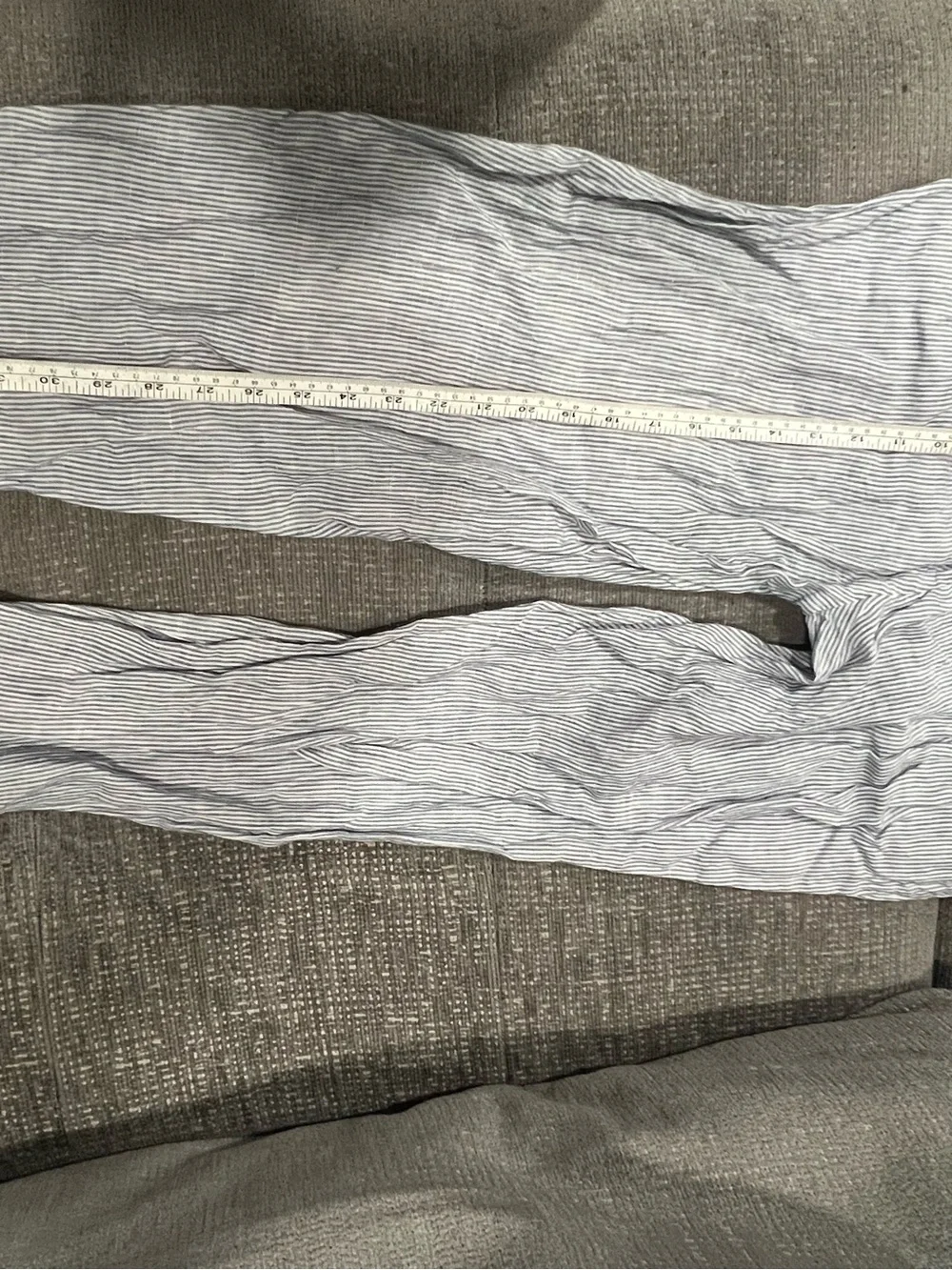 Quince 100% European Linen Tapered Ankle Pants in the Blue Pinstripe pattern.